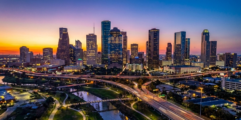 A panoramic view of Houston at sunset.