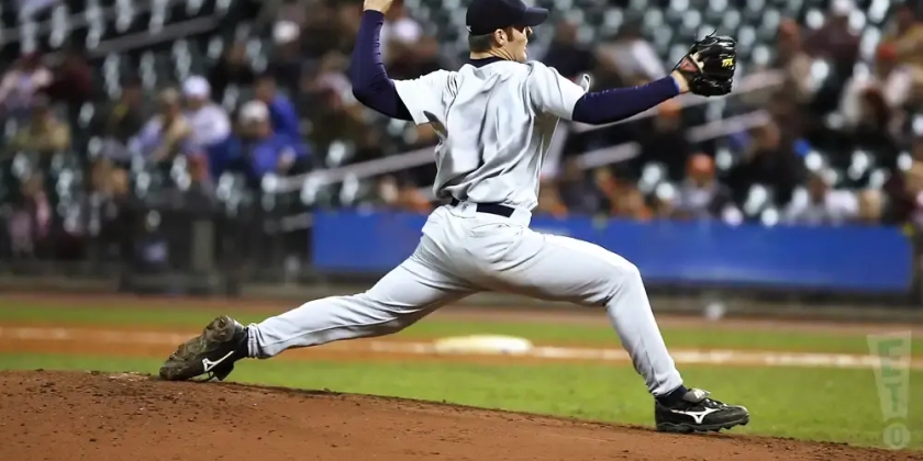 A pitcher throws a ball at an MLB baseball game.