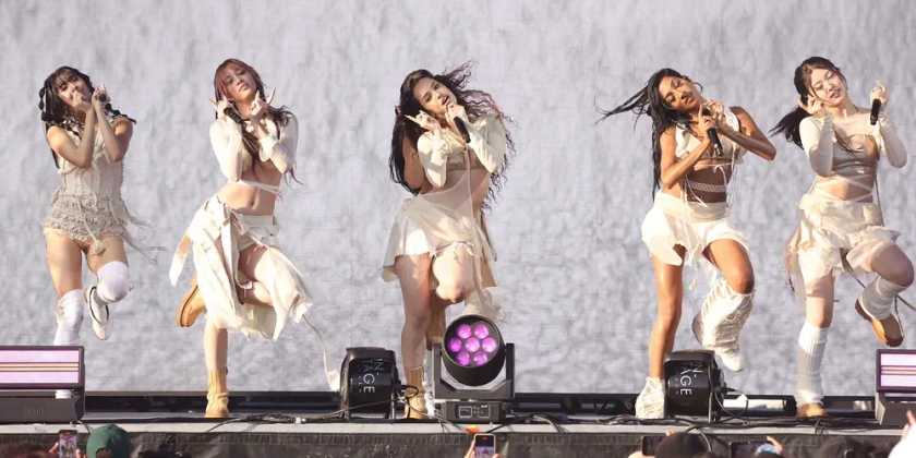 Katseye performs on stage.