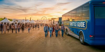 Attendees using the Stagecoach shuttle service at the music festival.