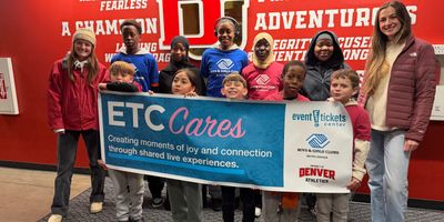 Students from Boys & Girls Clubs of Metro Denver during a DU Hockey game.