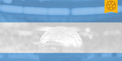 The Argentina flag over a golden globe soccer ball in the middle of a soccer field.