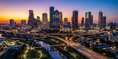 A panoramic view of Houston at sunset.