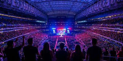 An interior view of Reliant Stadium during a live concert.