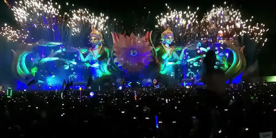 A view of the vibrant lit-up stage at EDC Orlando with a large crowd.